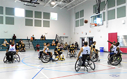 people playing basketball in wheelchairs