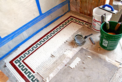 Much of the original tilework was cleaned and kept in place, but some new matching tiles also needed to be installed. 