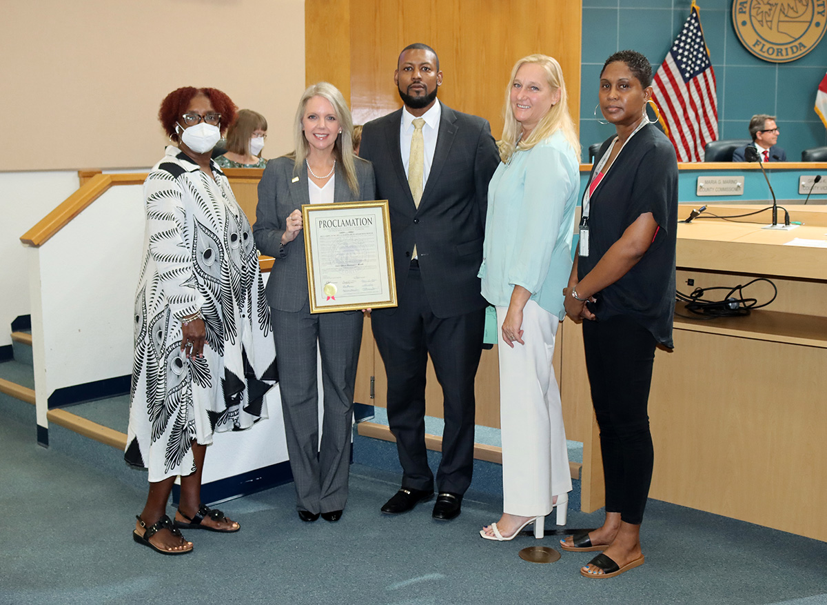 Marsha Hibbert, Commissioner McKinlay, Community Services Department Director James Green, Tammy Lampi and Sabrena Cooper