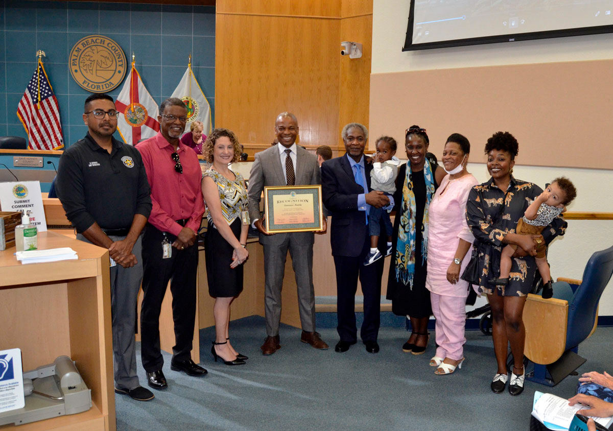 representatives from the Palm Beach County Sheriff’s Office, Commissioner Bernard, Lawrence Mundy and family members