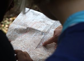 looking at a map for geocaching