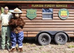 Picture of Smokey the Bear and Florida Forest Service Staff