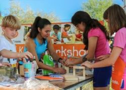 Kids building bird houses at natural areas festival