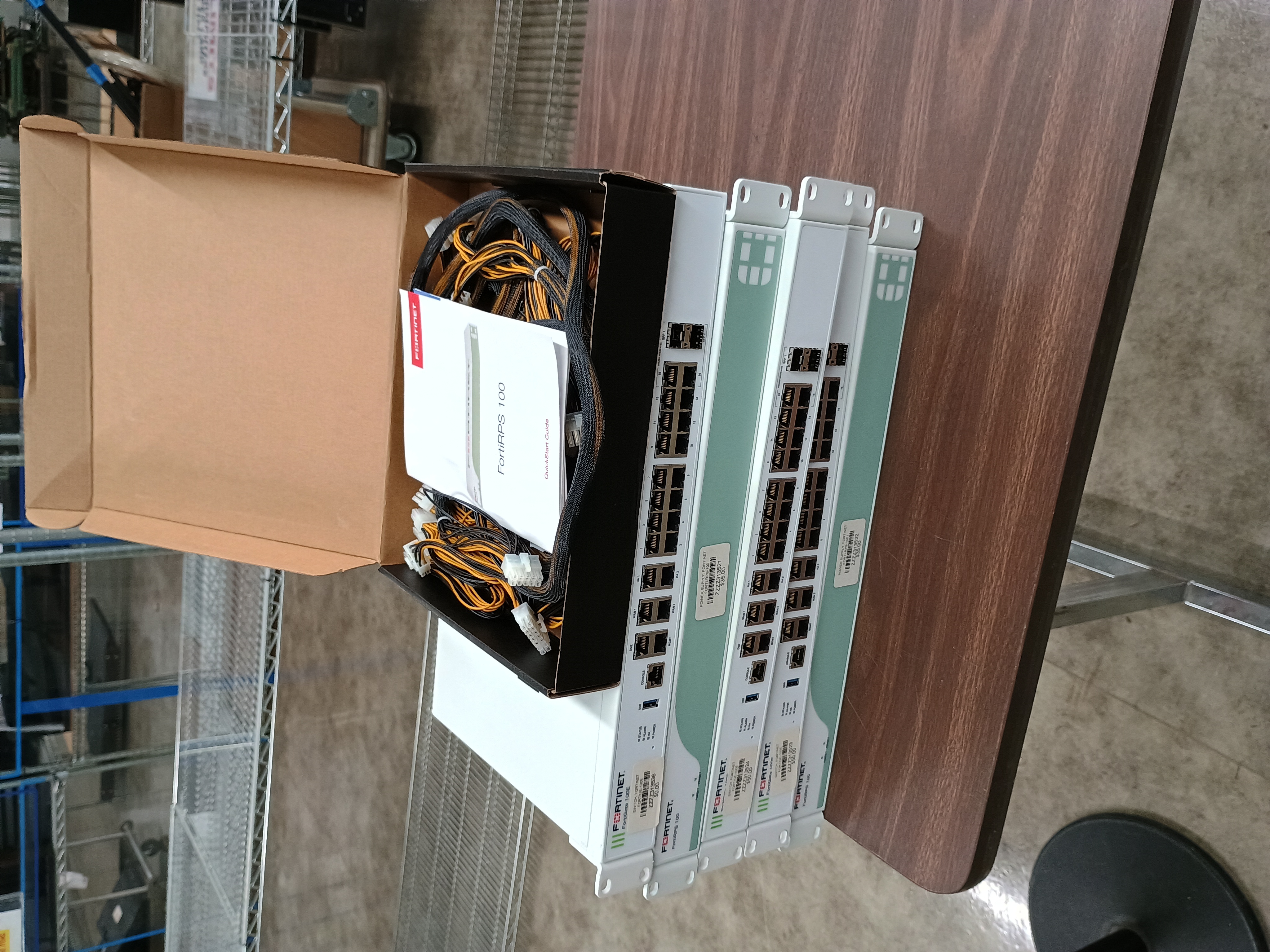 Stack of five Fortinet devices.jpg