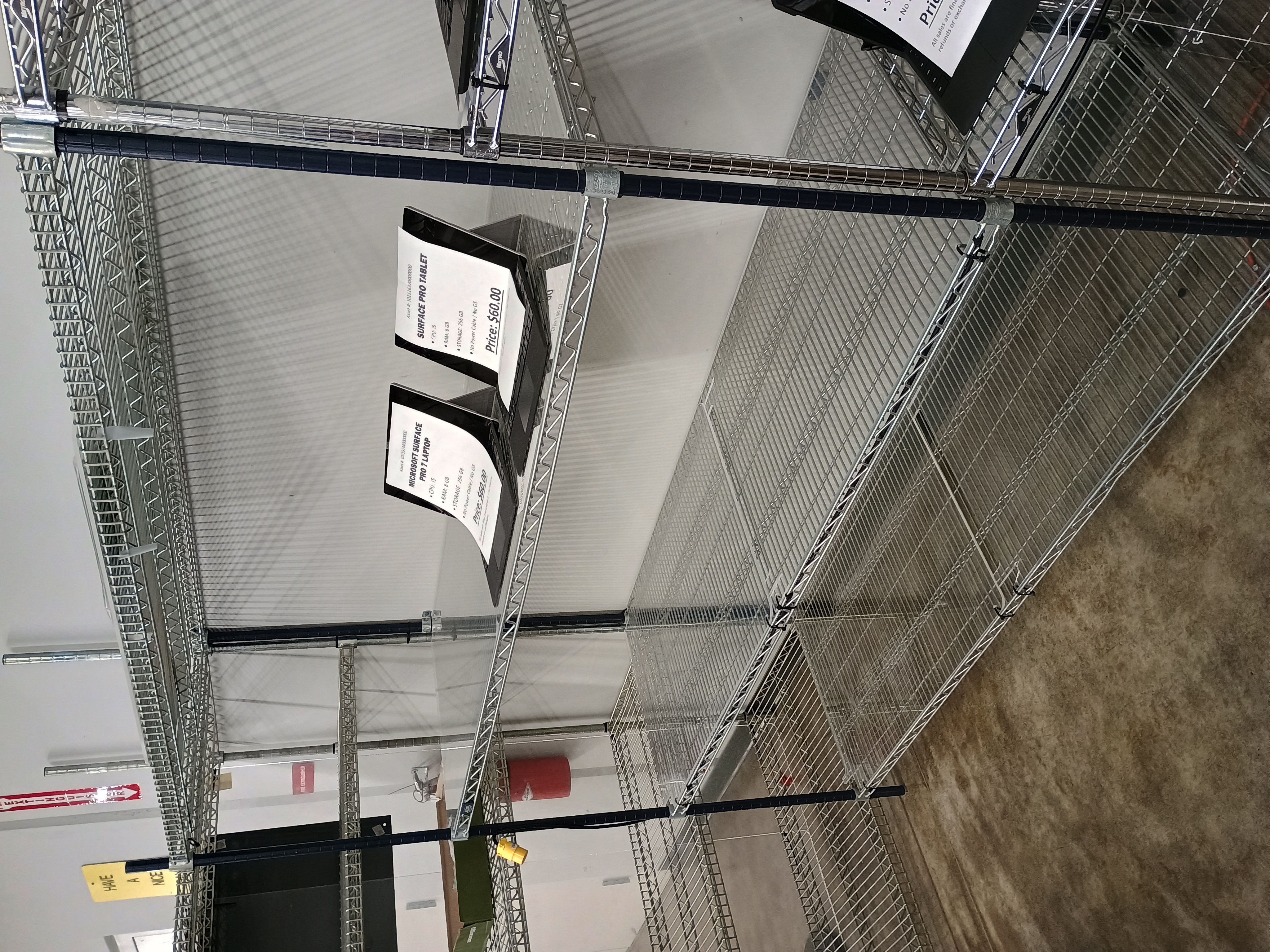 Two tablets on wire shelving.jpg