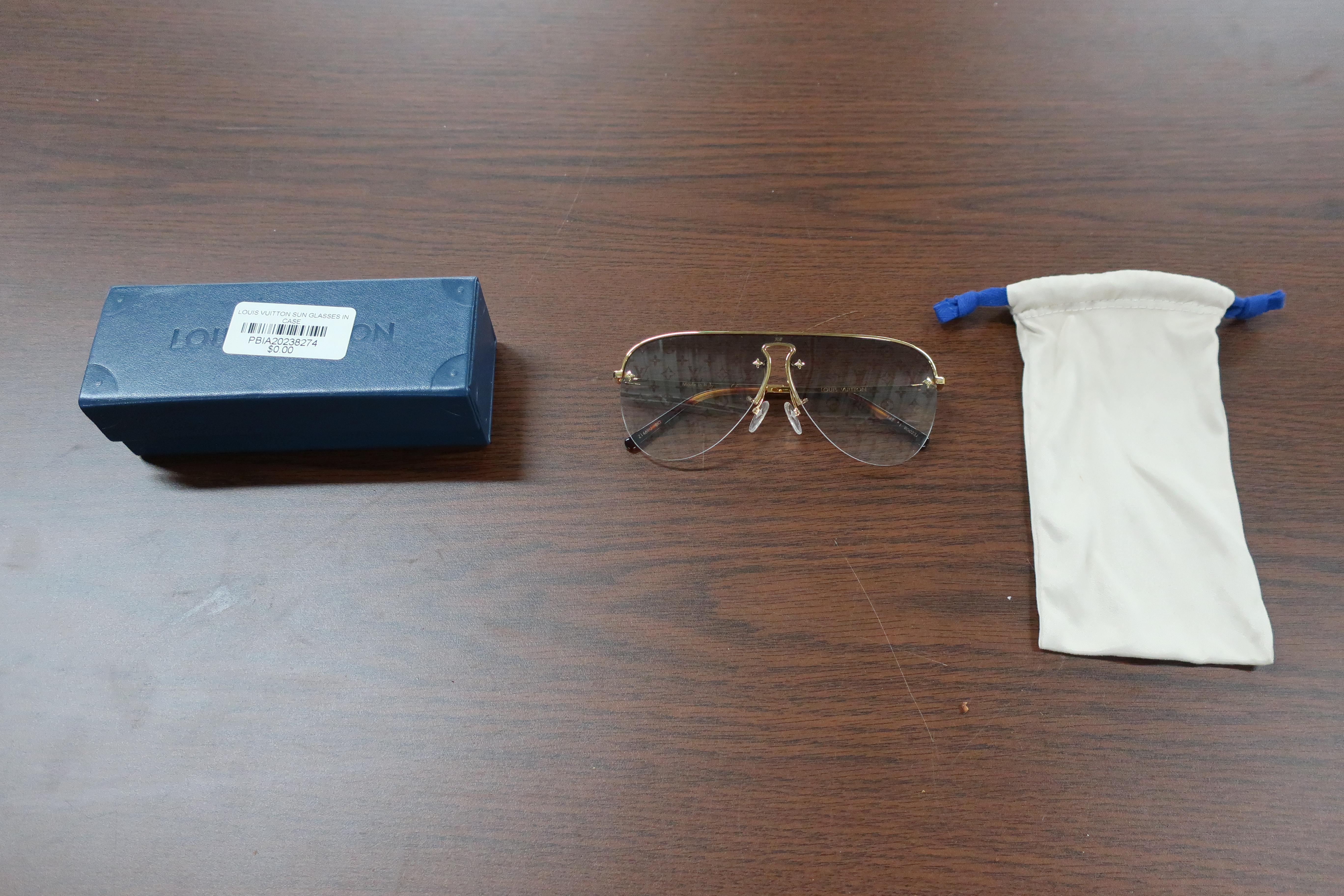 Sold at Auction: Louis Vuitton Sunglasses with Case