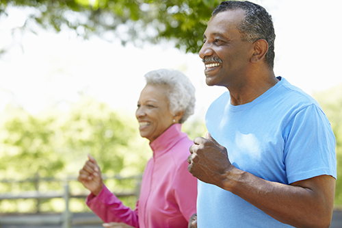 man and woman walking outdoors