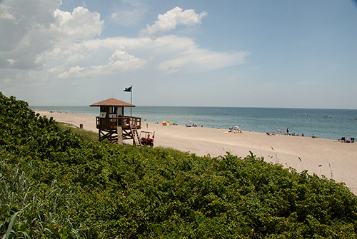 scenic view of beach with lifeguard tower