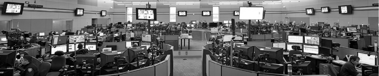 911 Professionals in large room with computer monitors